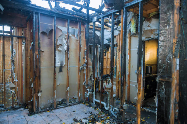 Professional Emergency Fire Damage Restoration technician working in Fairfax, MN